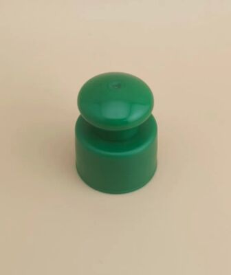 Kozmetik şişeleri için düğmeli yeşil plastik yumuşak kapağı